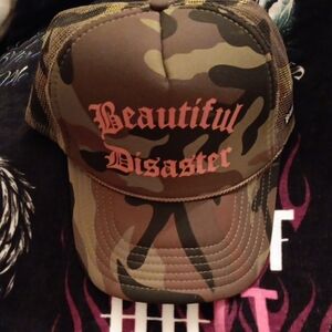 Camouflage Trucker Hat with Orange Text